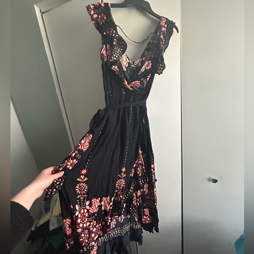 Black floral dress. V-neck, ruffles, high low hem. Never worn.
